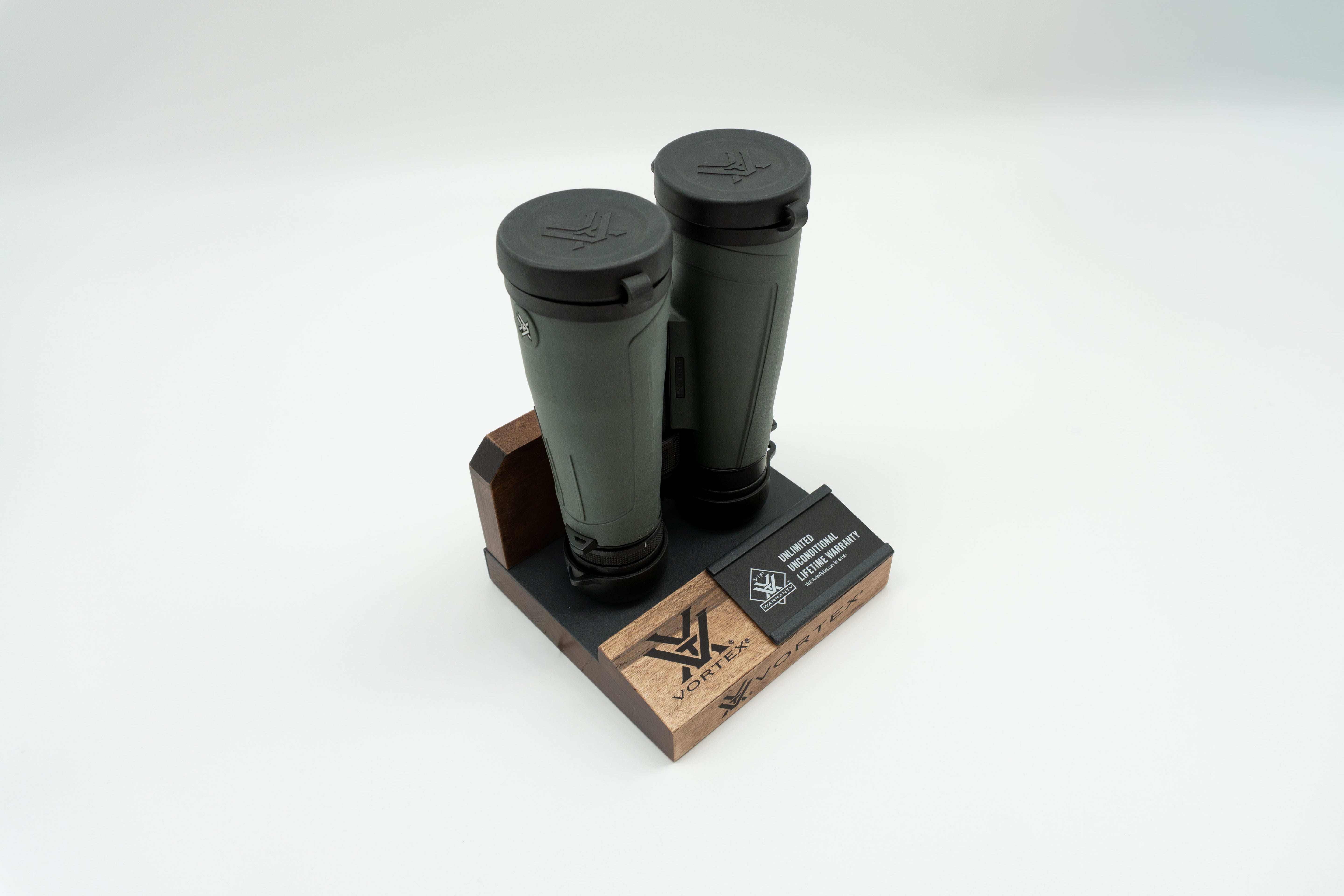 Pre-owned Vortex Kaibab HD 18x56 binoculars, objective side, three-quarter view on Vortex retail block - The Lookout, Prescott AZ