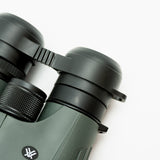Pre-owned Vortex Kaibab HD 18x56 binoculars, objective side, three-quarter view on Vortex retail block - The Lookout, Prescott AZ