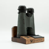 Pre-owned Vortex Kaibab HD 18x56 binoculars, objective side, three-quarter view on Vortex retail block - The Lookout, Prescott AZ