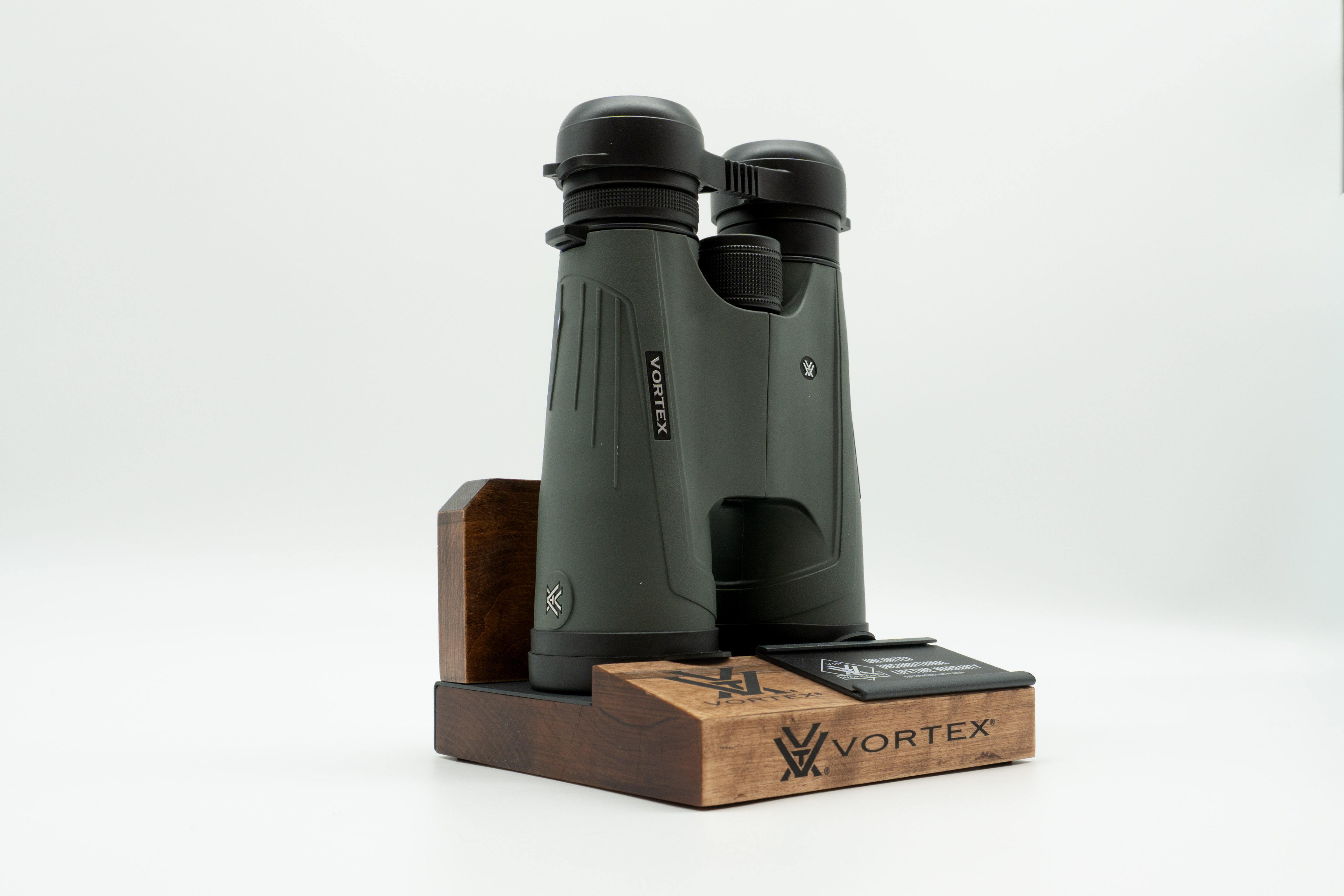 Pre-owned Vortex Kaibab HD 18x56 binoculars, objective side, three-quarter view on Vortex retail block - The Lookout, Prescott AZ