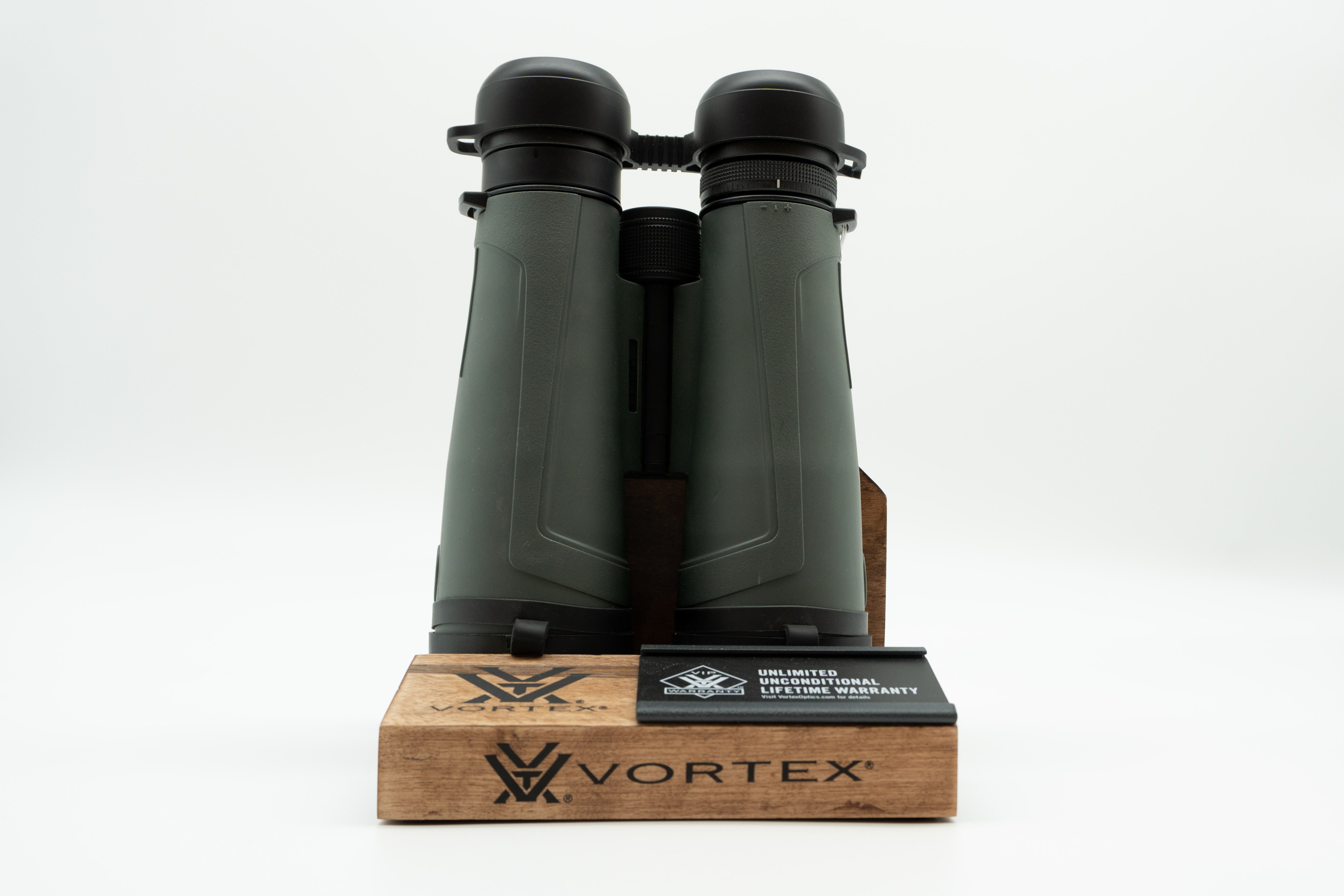 Pre-owned Vortex Kaibab HD 18x56 binoculars, objective side, three-quarter view on Vortex retail block - The Lookout, Prescott AZ