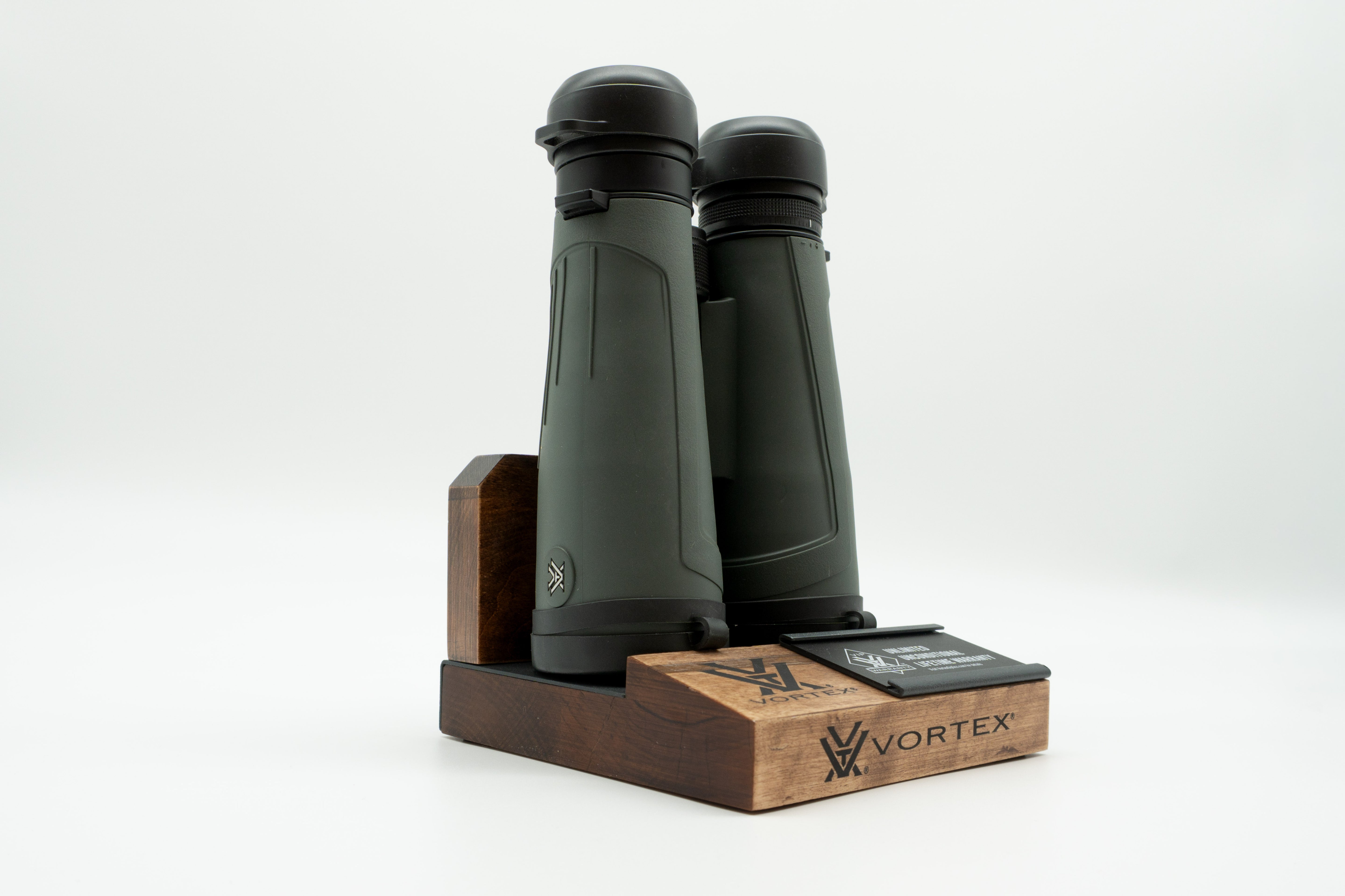 Pre-owned Vortex Kaibab HD 18x56 binoculars, objective side, three-quarter view on Vortex retail block - The Lookout, Prescott AZ