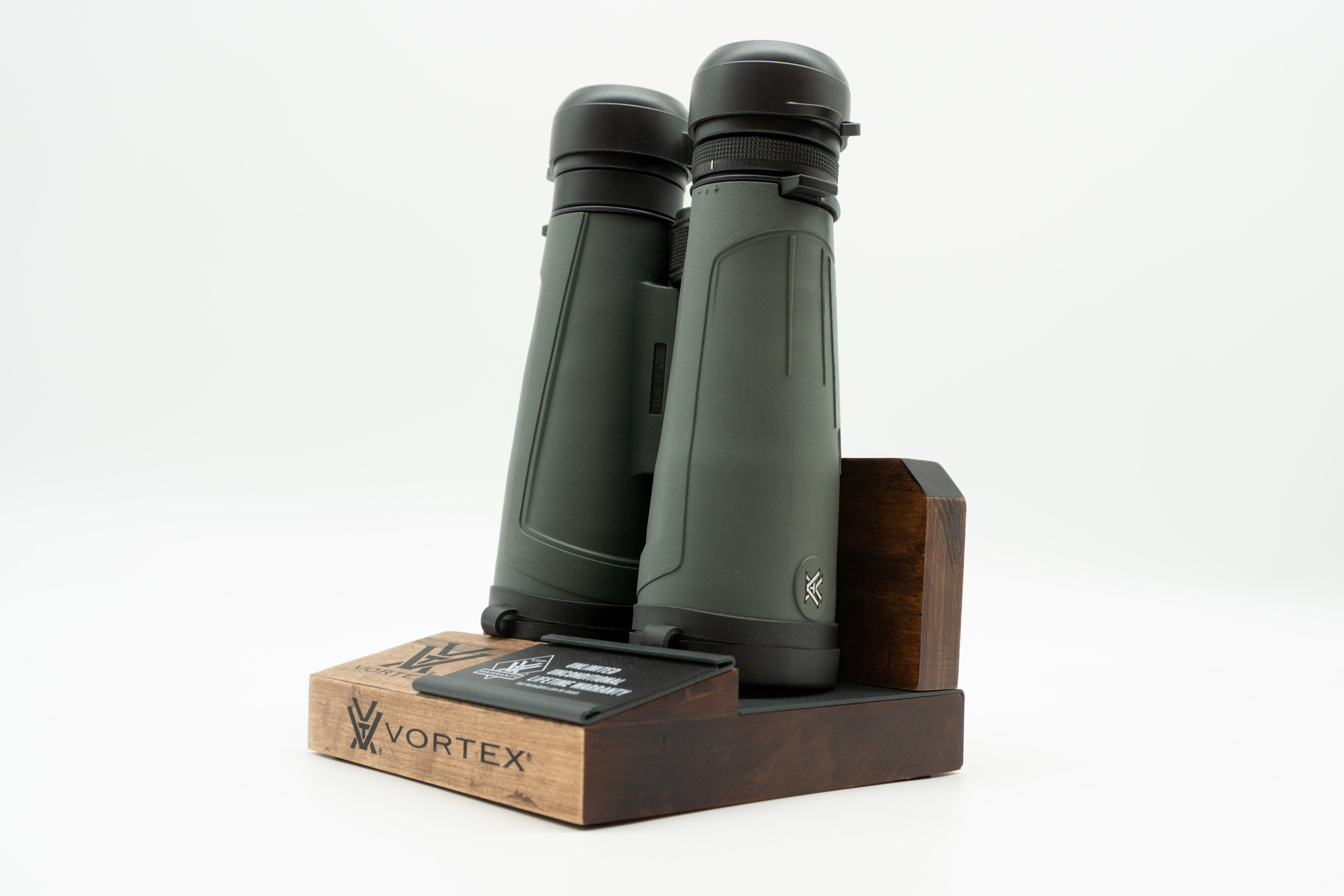 Pre-owned Vortex Kaibab HD 18x56 binoculars, objective side, three-quarter view on Vortex retail block - The Lookout, Prescott AZ
