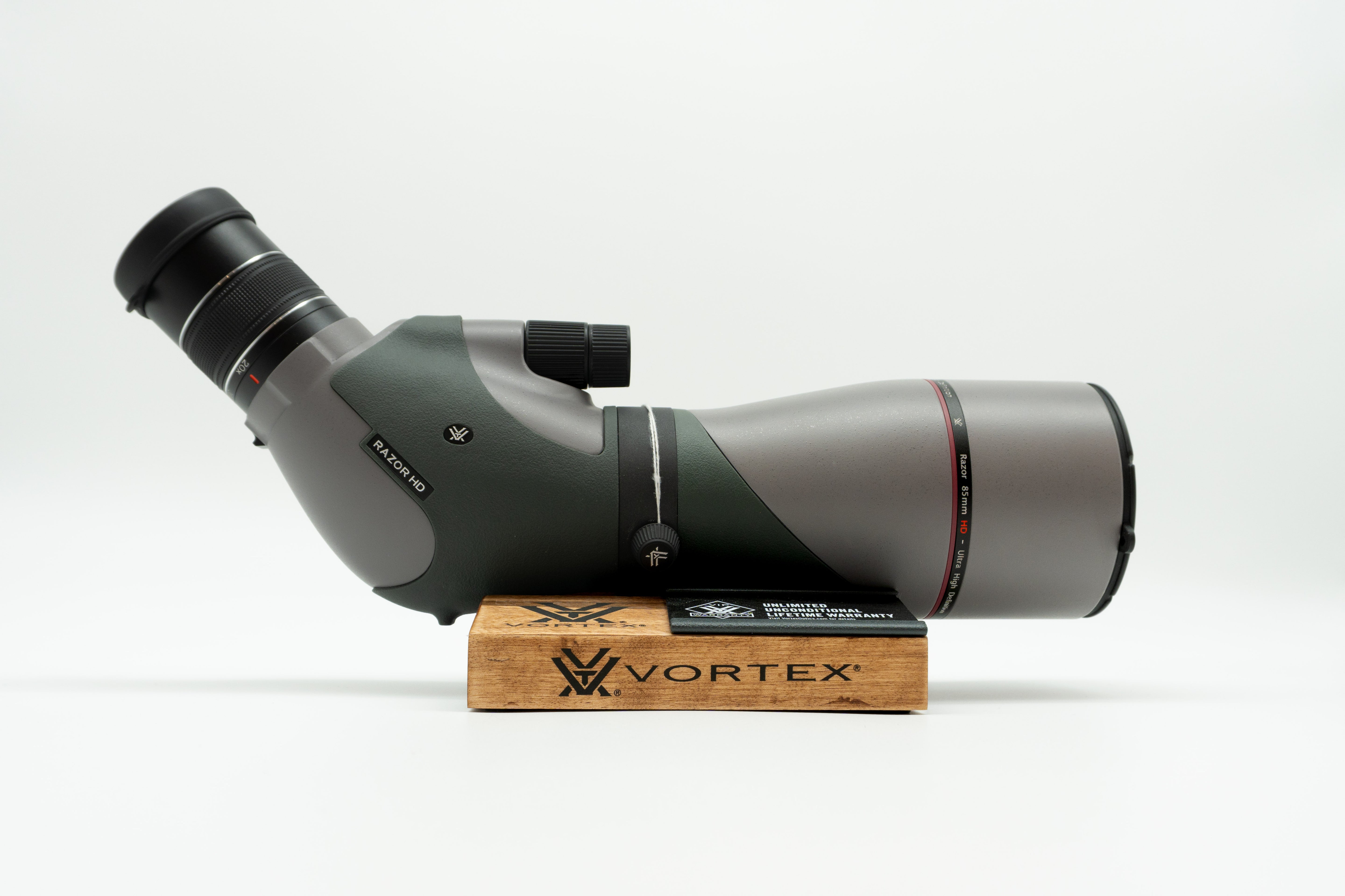 Pre-owned VORTEX Razor HD 20–60x85 Angled Spotting Scope, objective side, three-quarter view on Vortex retail block - The Lookout, Prescott AZ