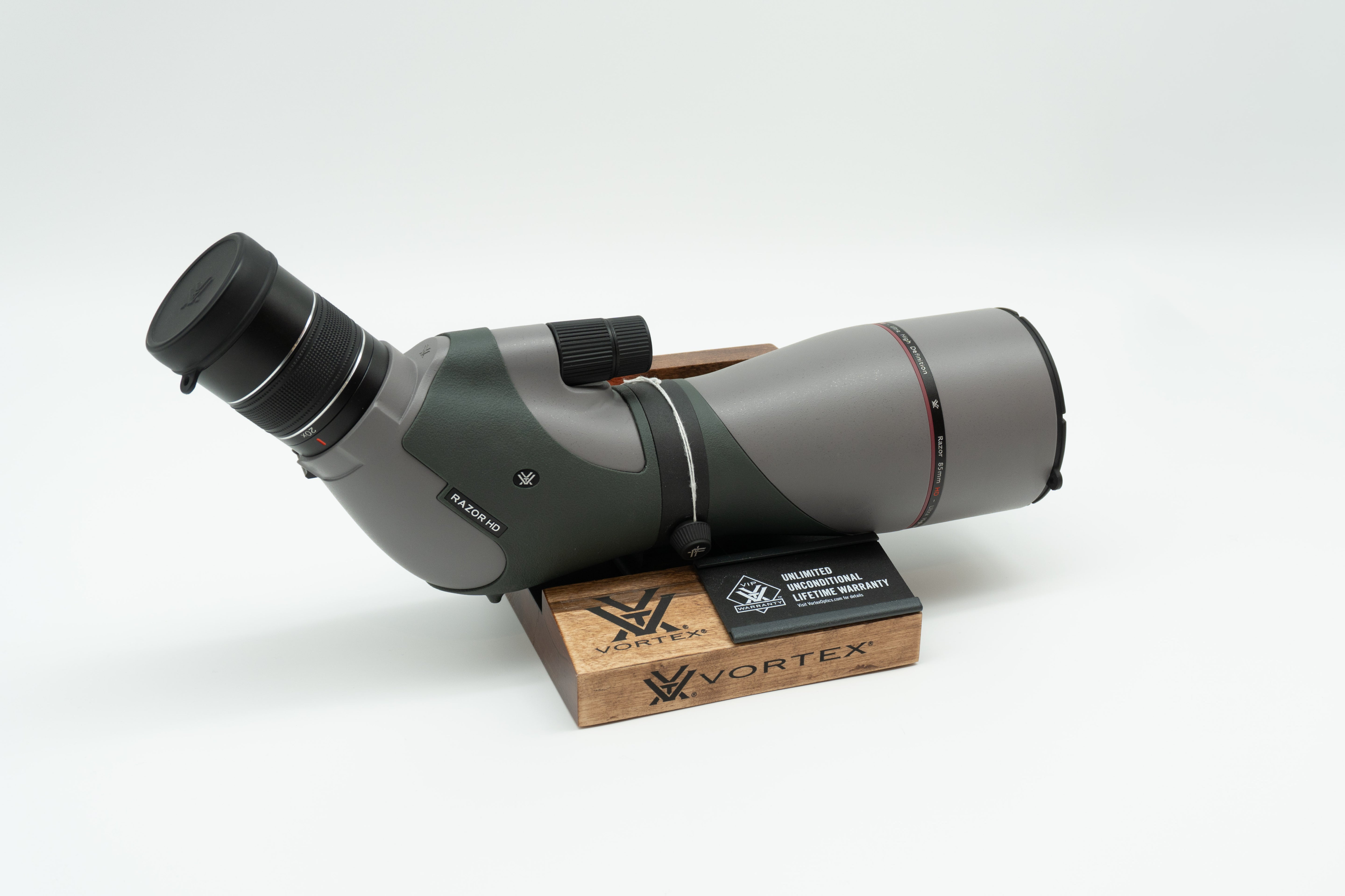 Pre-owned VORTEX Razor HD 20–60x85 Angled Spotting Scope, objective side, three-quarter view on Vortex retail block - The Lookout, Prescott AZ