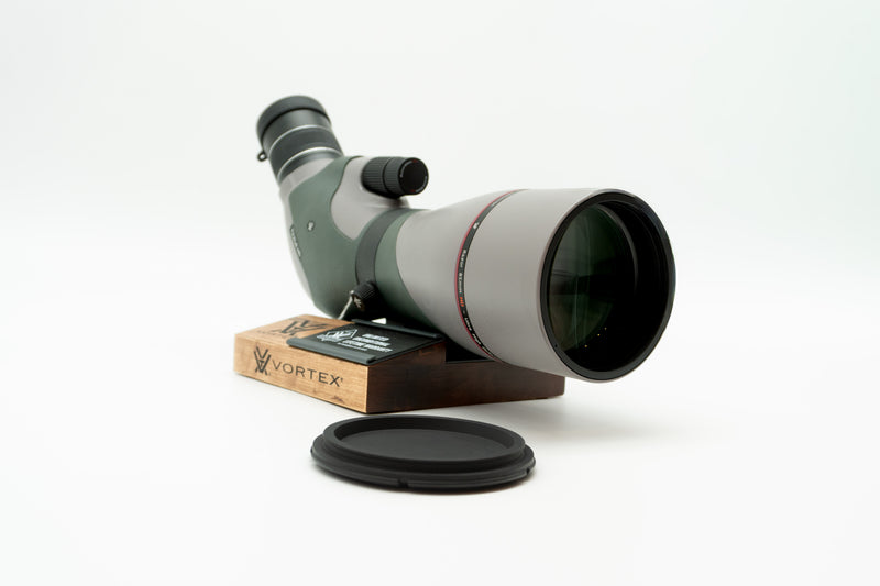 Pre-owned VORTEX Razor HD 20–60x85 Angled Spotting Scope, objective side, three-quarter view on Vortex retail block - The Lookout, Prescott AZ