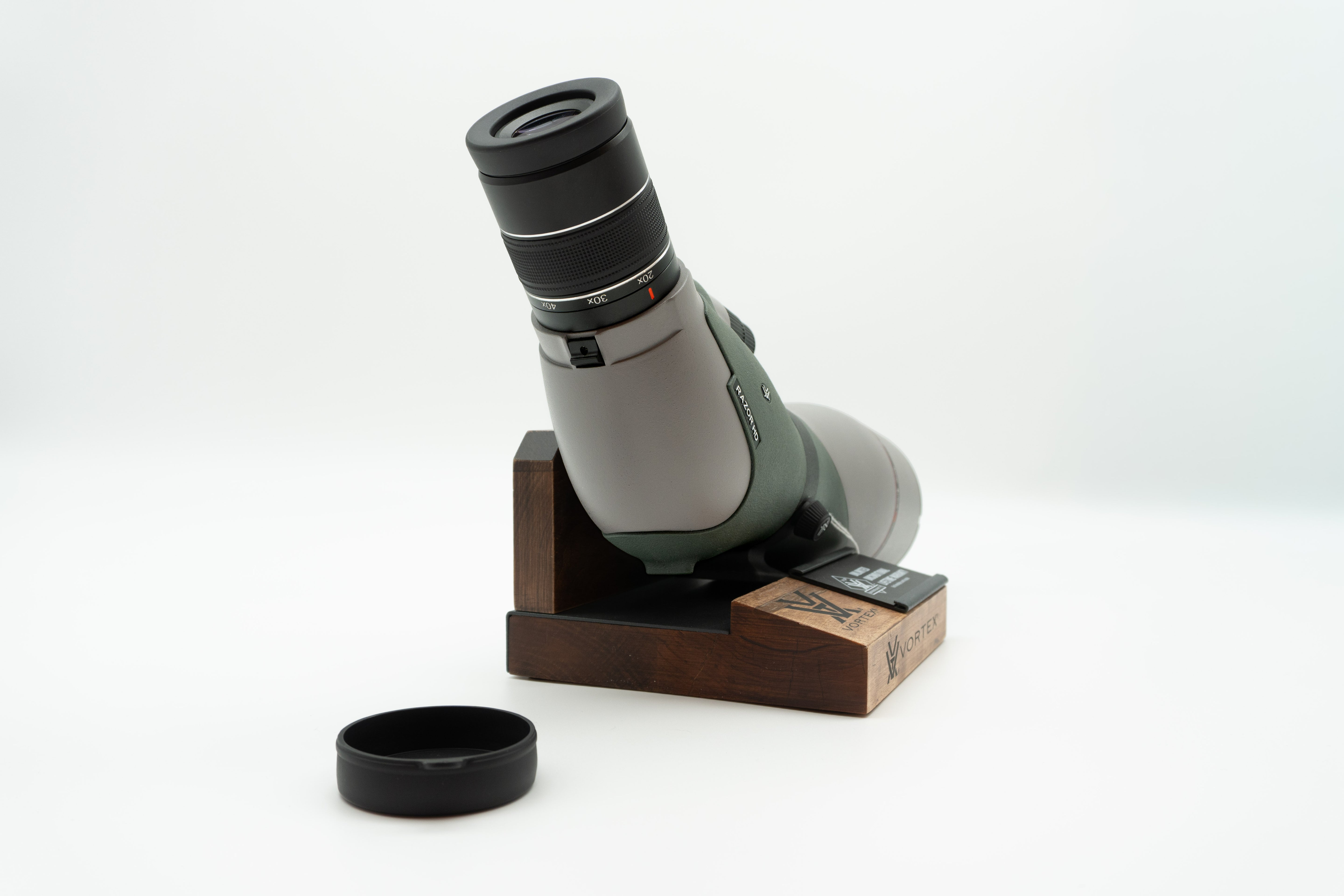 Pre-owned VORTEX Razor HD 20–60x85 Angled Spotting Scope, objective side, three-quarter view on Vortex retail block - The Lookout, Prescott AZ
