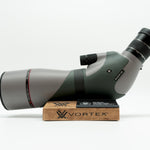 Pre-owned VORTEX Razor HD 20–60x85 Angled Spotting Scope, objective side, three-quarter view on Vortex retail block - The Lookout, Prescott AZ