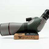 Pre-owned VORTEX Razor HD 20–60x85 Angled Spotting Scope, objective side, three-quarter view on Vortex retail block - The Lookout, Prescott AZ